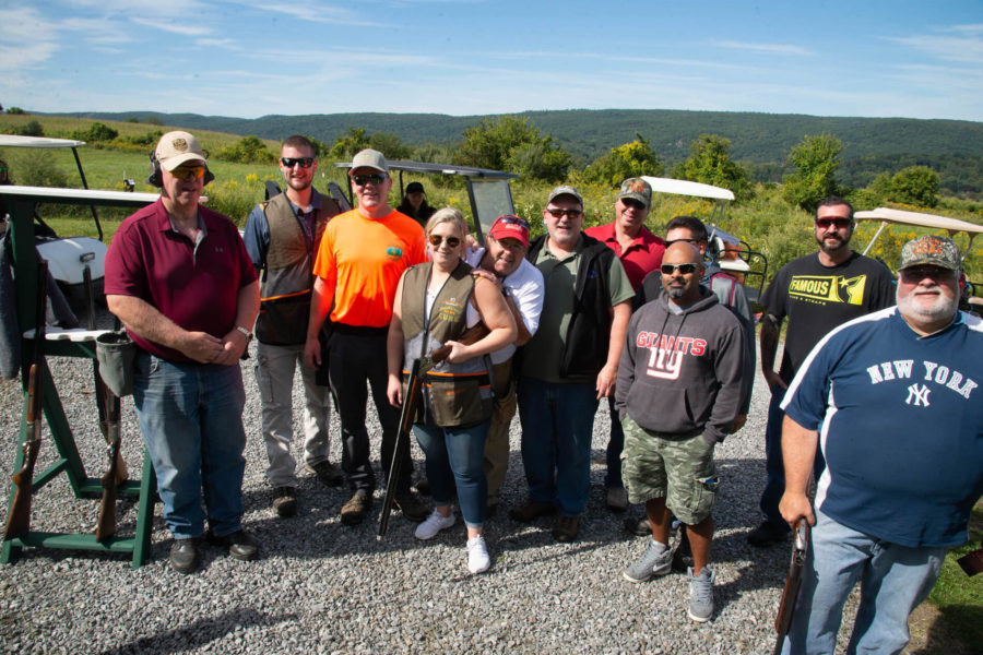 Group of people at outdoor shooting range