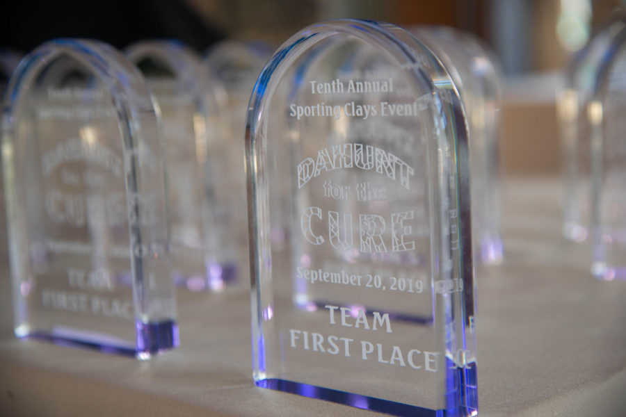 Engraved glass trophies reading "Team First Place