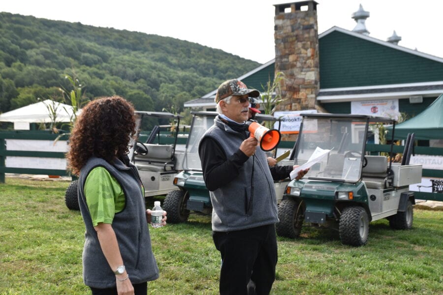 Man with megaphone speaking at outdoor event
